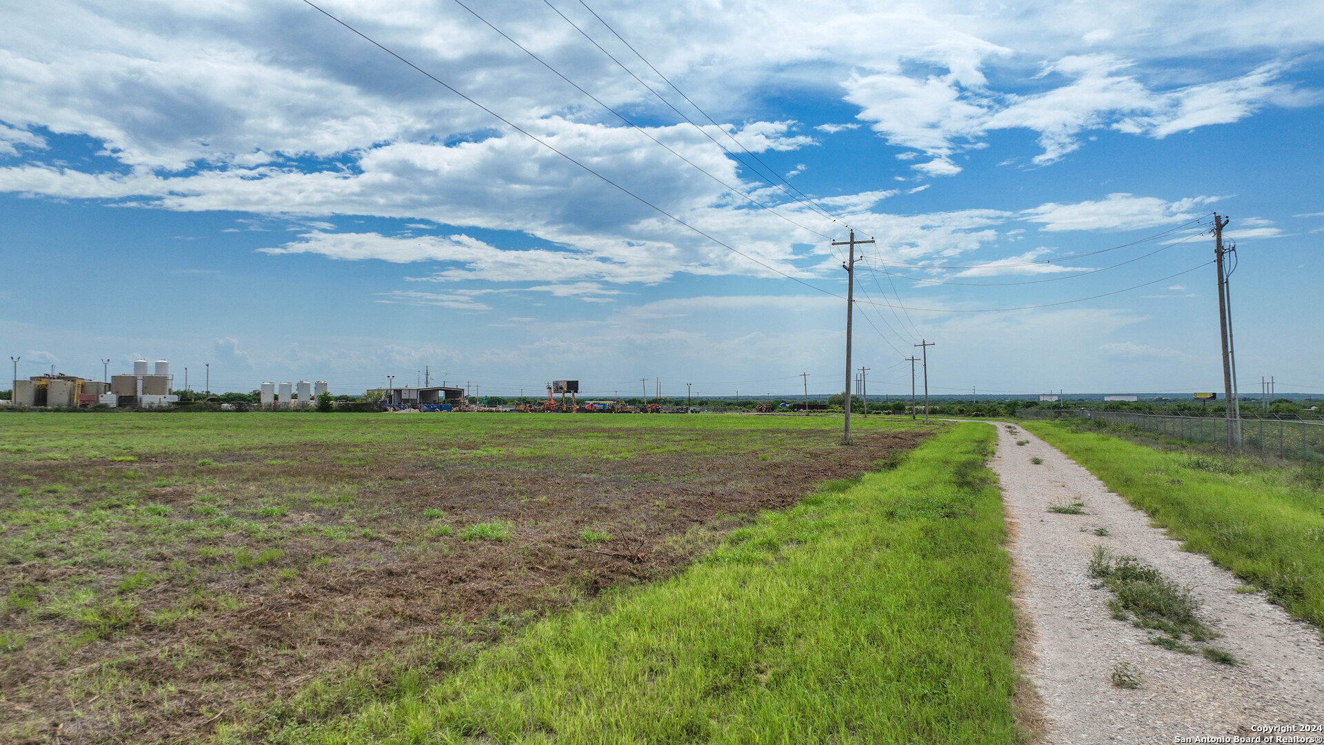 0 North I-37 Access Road Three Rivers, TX 78071 - Photo 8 of 11 a view of a golf course with a lake