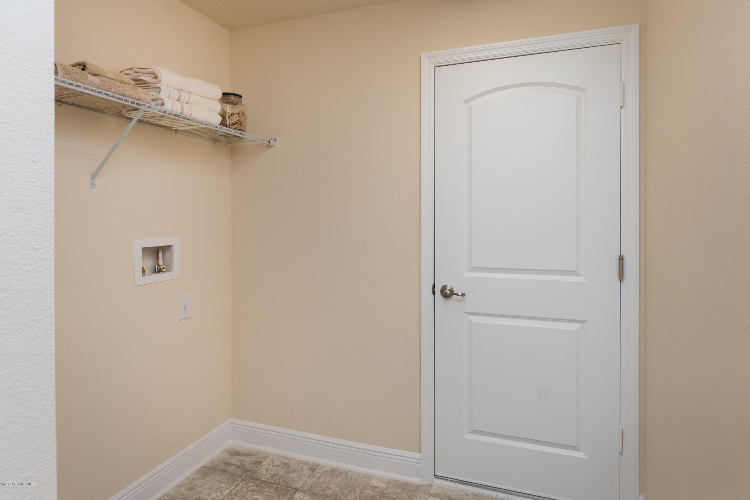 941 Degroodt Road Southwest Palm Bay, FL 32908 - Photo 20 of 22 Laundry Room