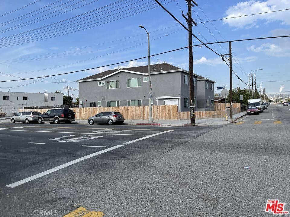 437 North Fries Avenue, Unit 1 Wilmington, CA 90744 - Photo 1 of 14 a car parked on the side of a street