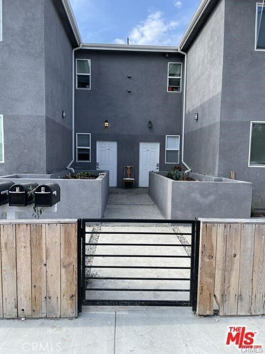 437 North Fries Avenue, Unit 1 Wilmington, CA 90744 - Photo 4 of 14 a view of kitchen with stainless steel appliances granite countertop counter top space