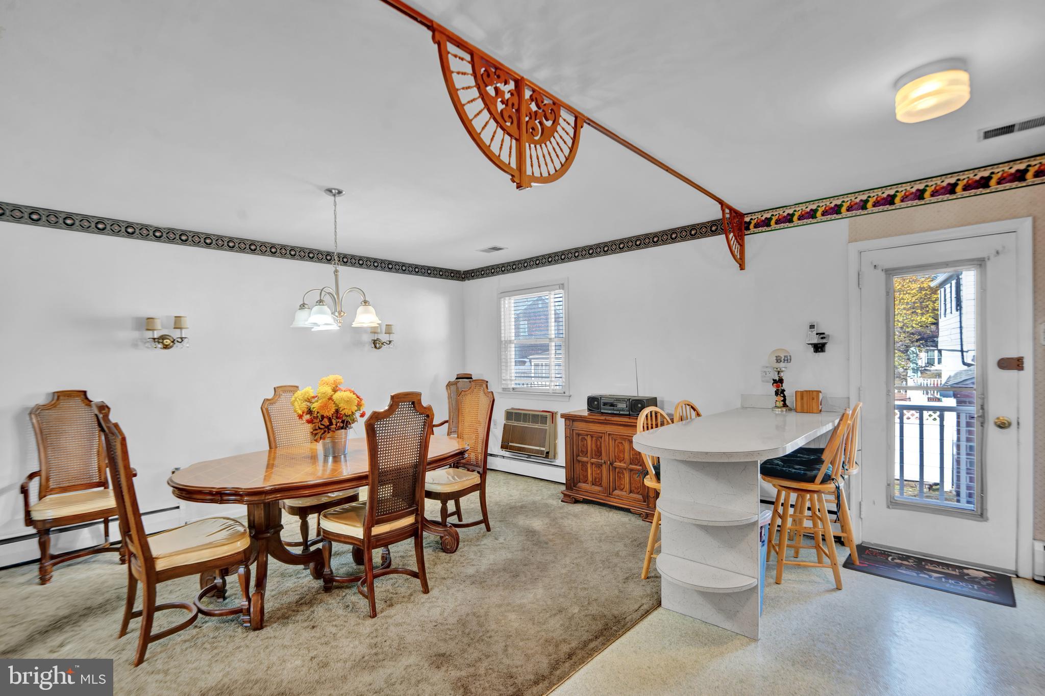 104 Gilmore Road Havertown, PA 19083 - Photo 11 of 47 a view of a dining room with furniture and chandelier