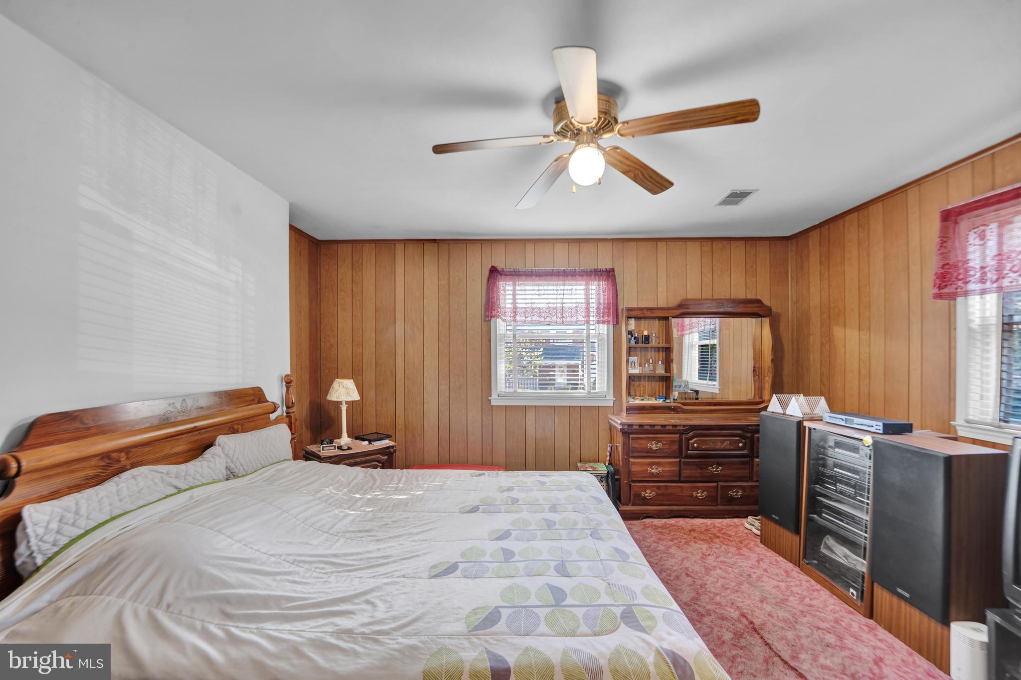 104 Gilmore Road Havertown, PA 19083 - Photo 21 of 47 a bedroom with a bed and wooden floor