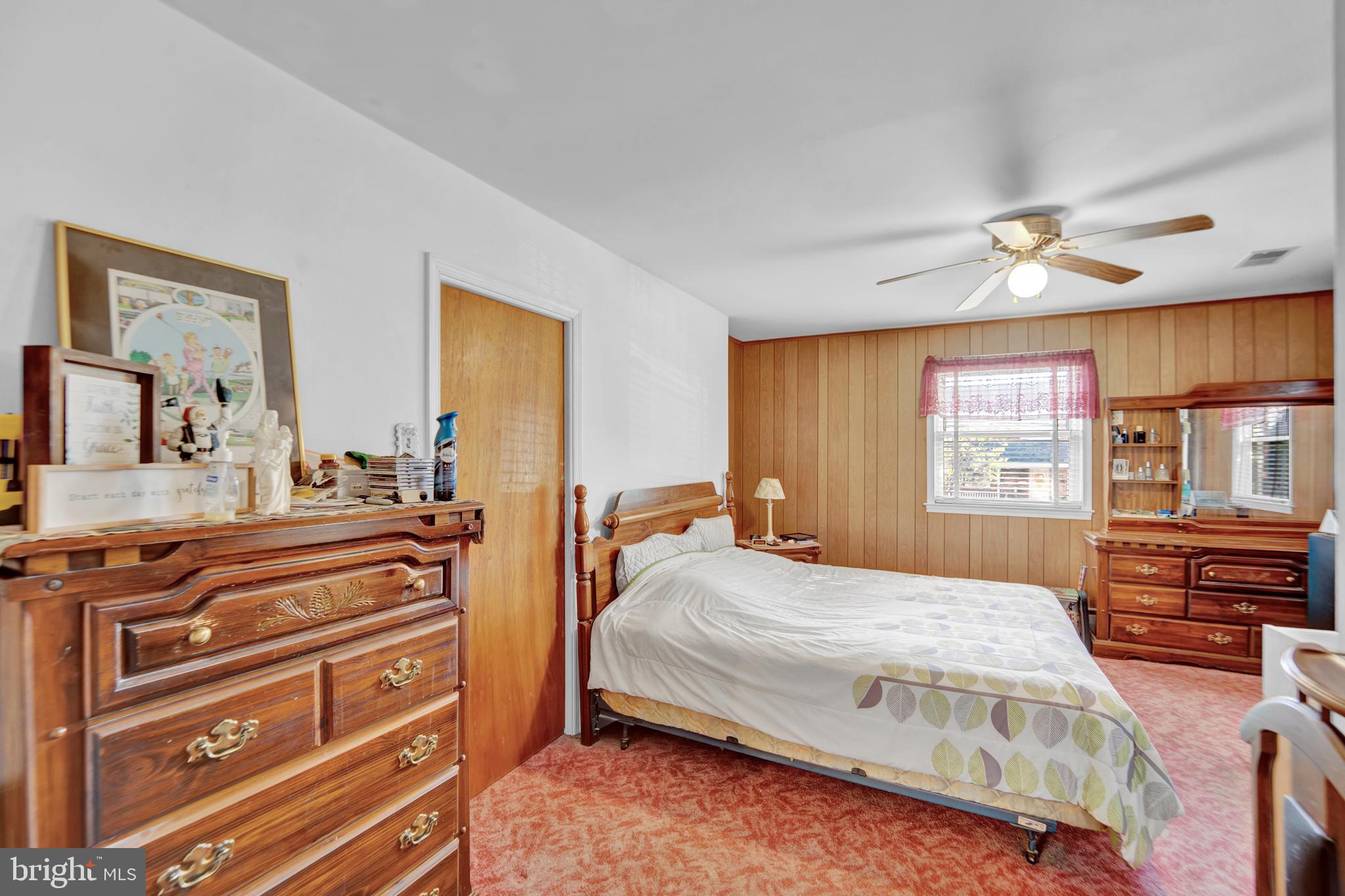 104 Gilmore Road Havertown, PA 19083 - Photo 22 of 47 a bedroom with a bed a dresser next to a window