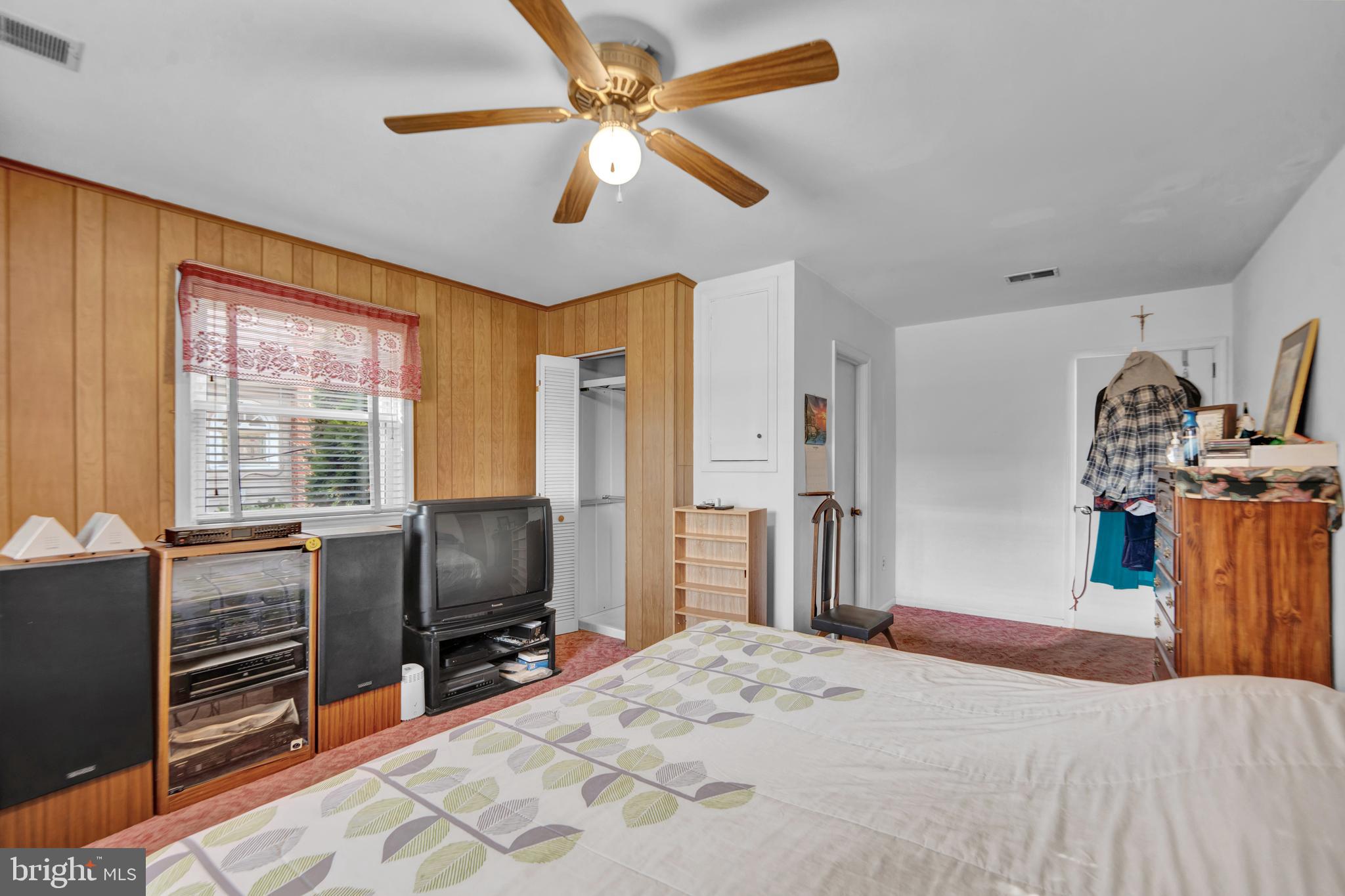 104 Gilmore Road Havertown, PA 19083 - Photo 23 of 47 a bedroom with a bed and a television