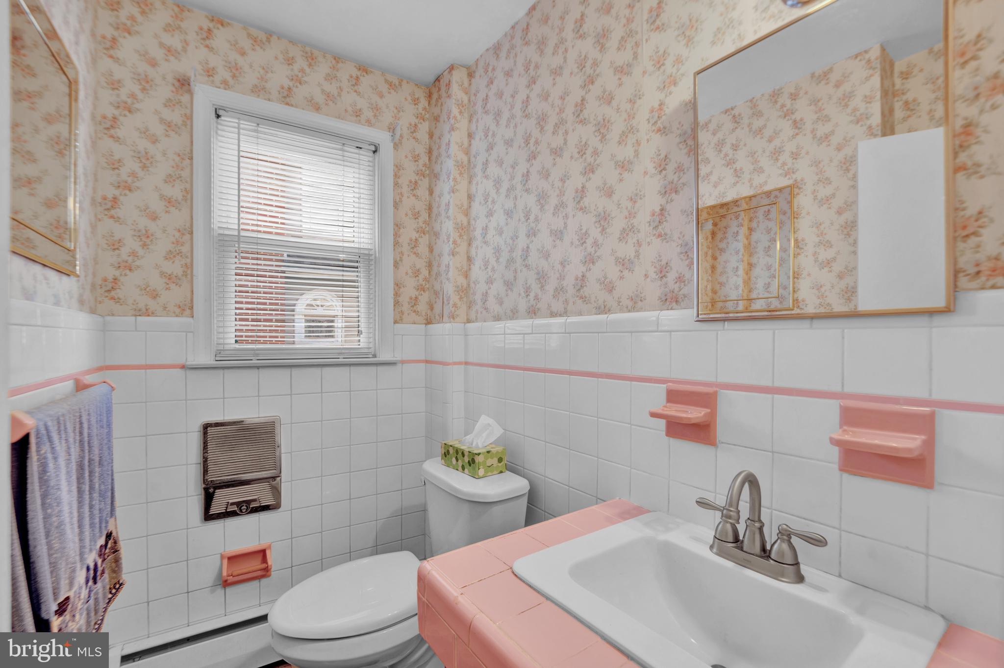 104 Gilmore Road Havertown, PA 19083 - Photo 24 of 47 a bathroom with a sink toilet and window