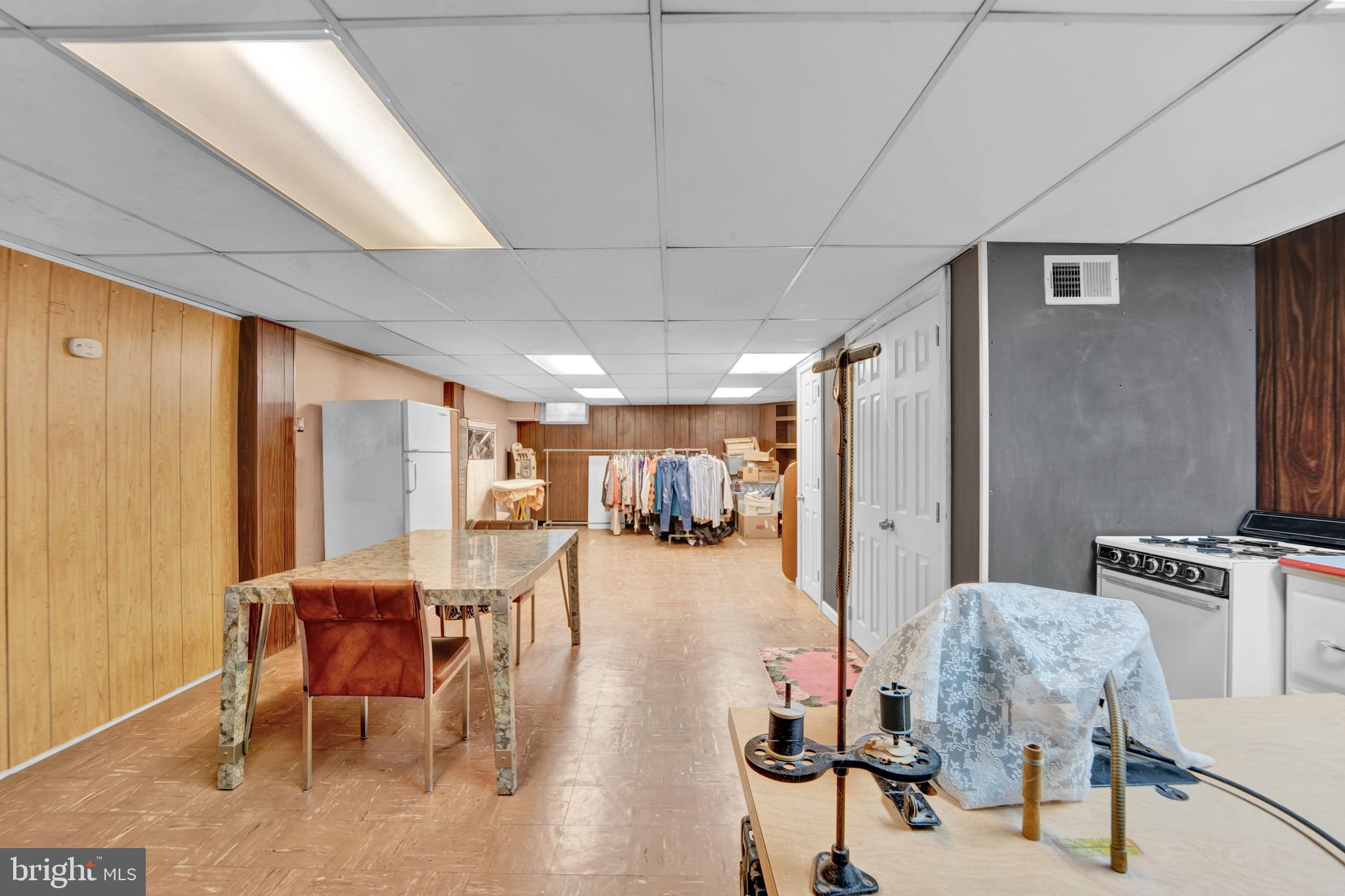 104 Gilmore Road Havertown, PA 19083 - Photo 31 of 47 a dining room with furniture and a chandelier