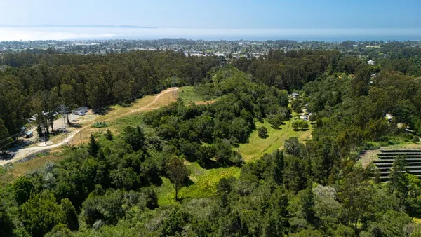 an aerial view of a city with lots of residential buildings