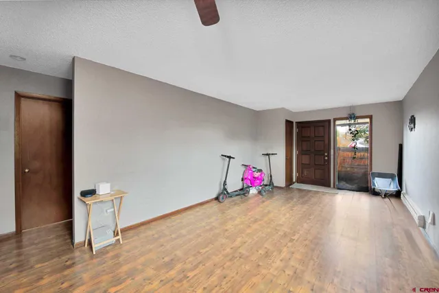 a view of an empty room and window