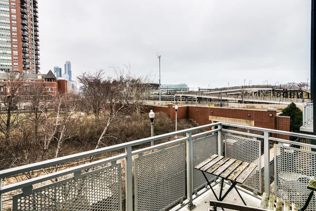 a view of a balcony with city view