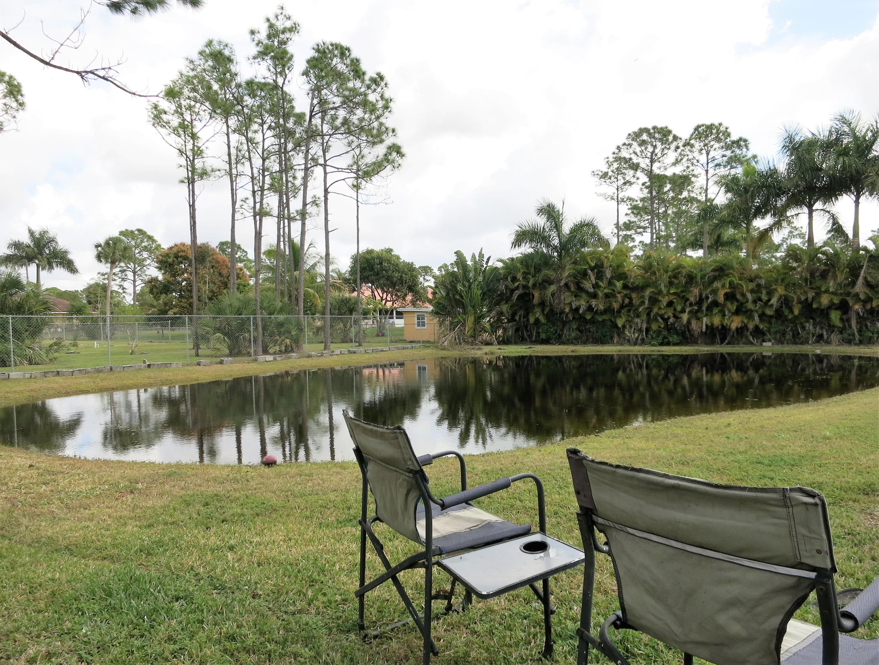 17977 78th Road North Loxahatchee, FL 33470 - Photo 25 of 37 Gather around the firepit!