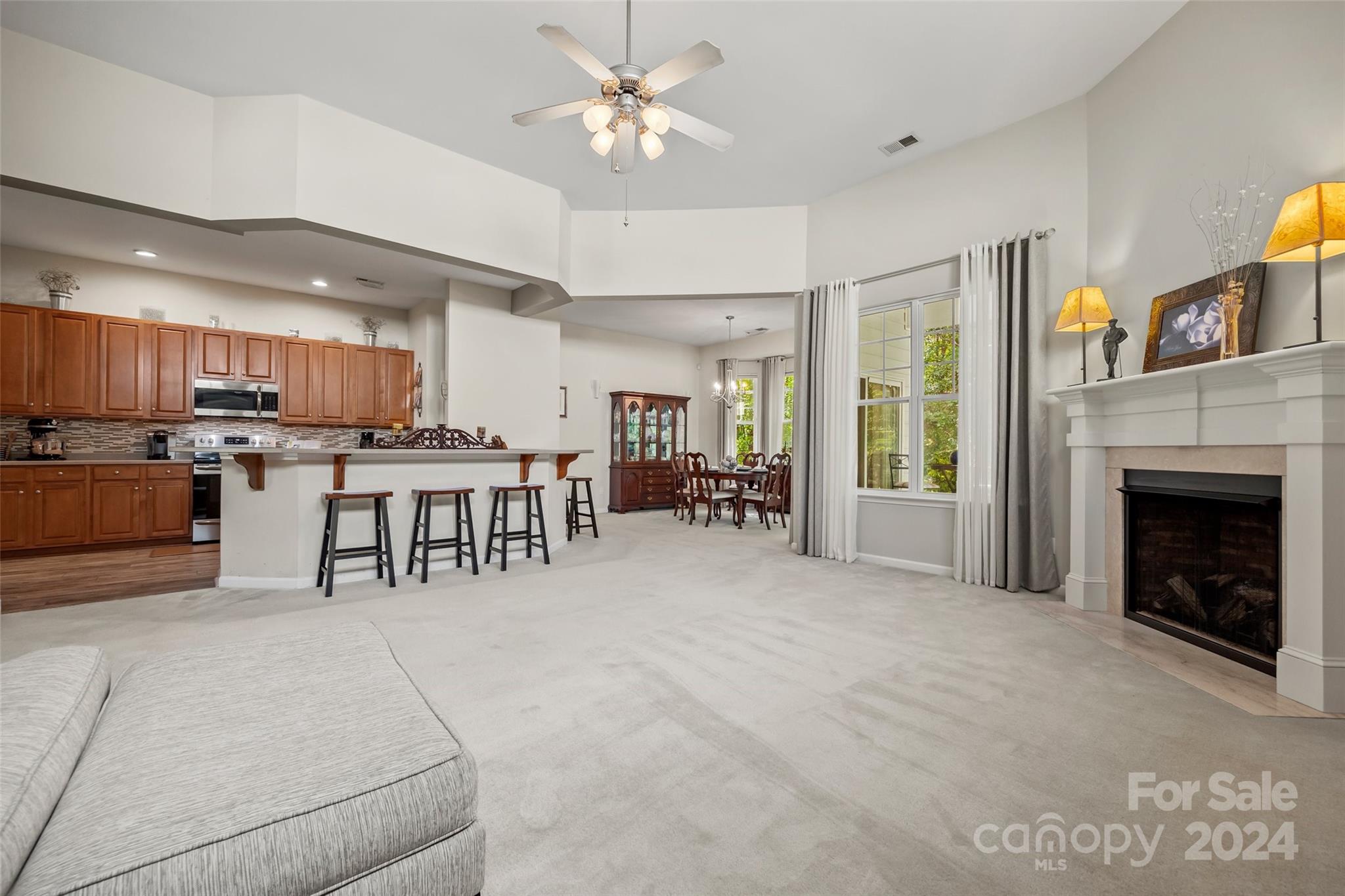 296 Sand Paver Way Fort Mill, SC 29708 - Photo 12 of 41 a view of a kitchen with furniture and a kitchen