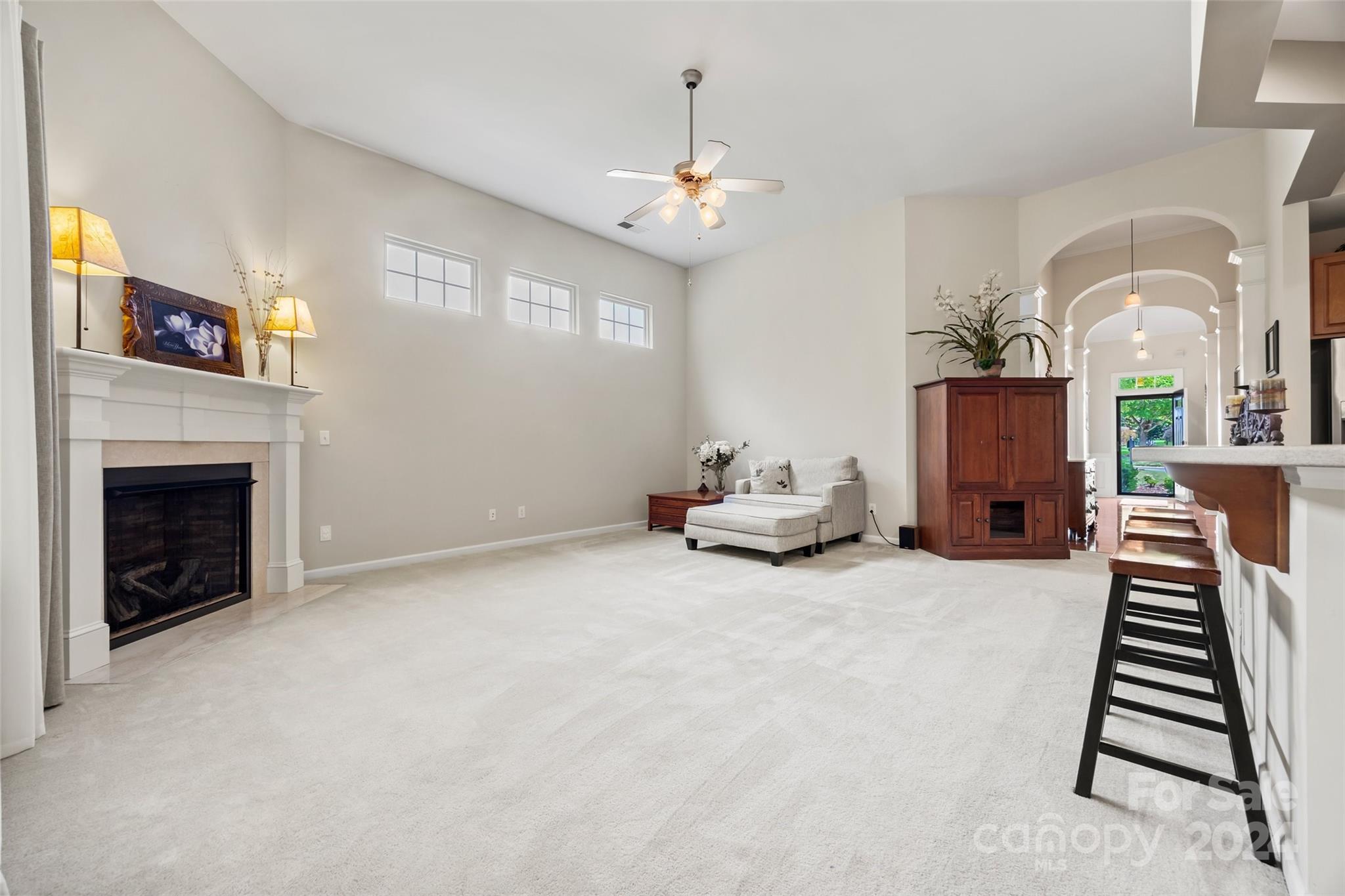 296 Sand Paver Way Fort Mill, SC 29708 - Photo 15 of 41 a living room with furniture and a fireplace
