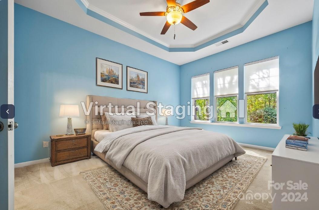 296 Sand Paver Way Fort Mill, SC 29708 - Photo 18 of 41 a bedroom with a large bed and a window