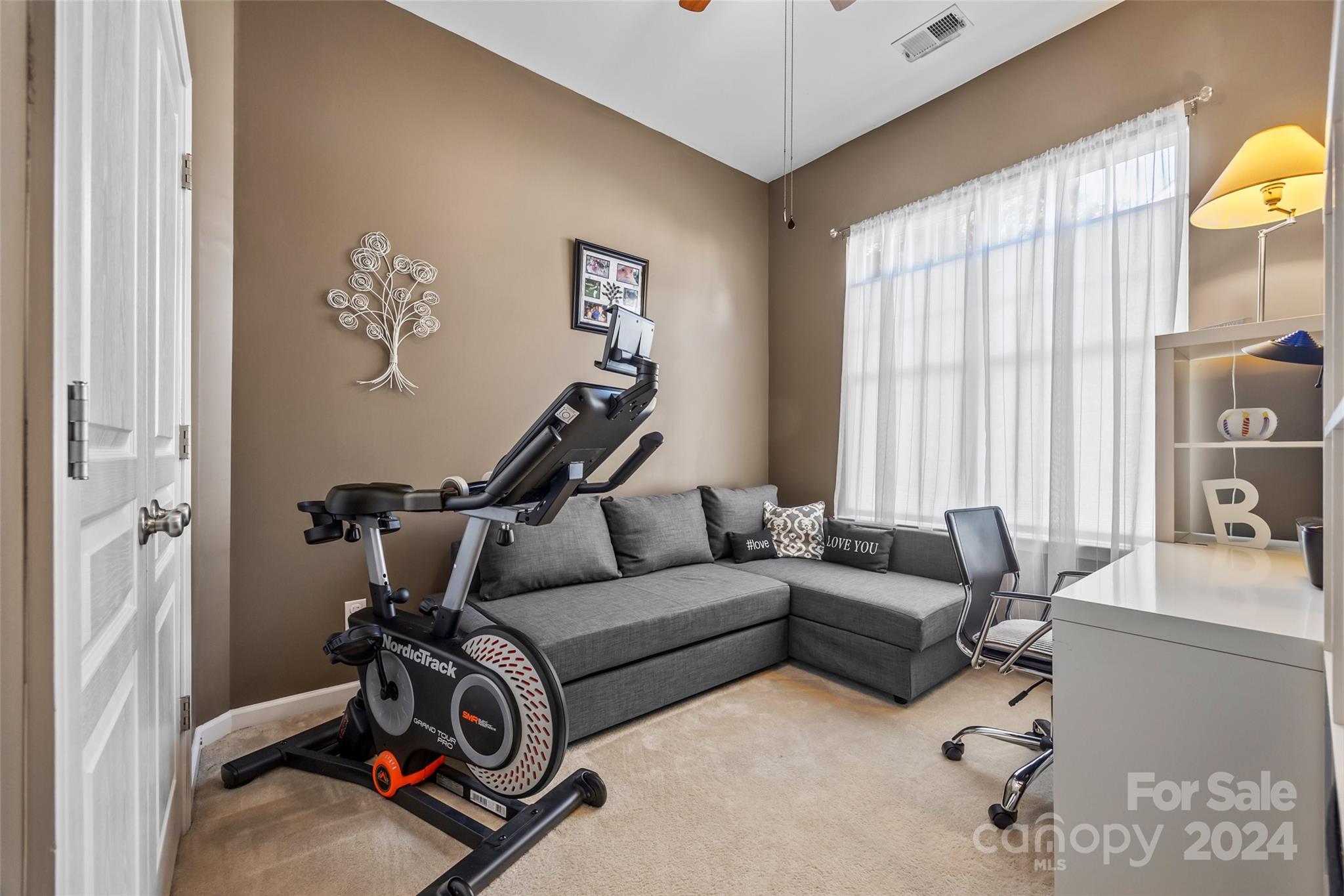 296 Sand Paver Way Fort Mill, SC 29708 - Photo 26 of 41 a living room with furniture a couch and a window
