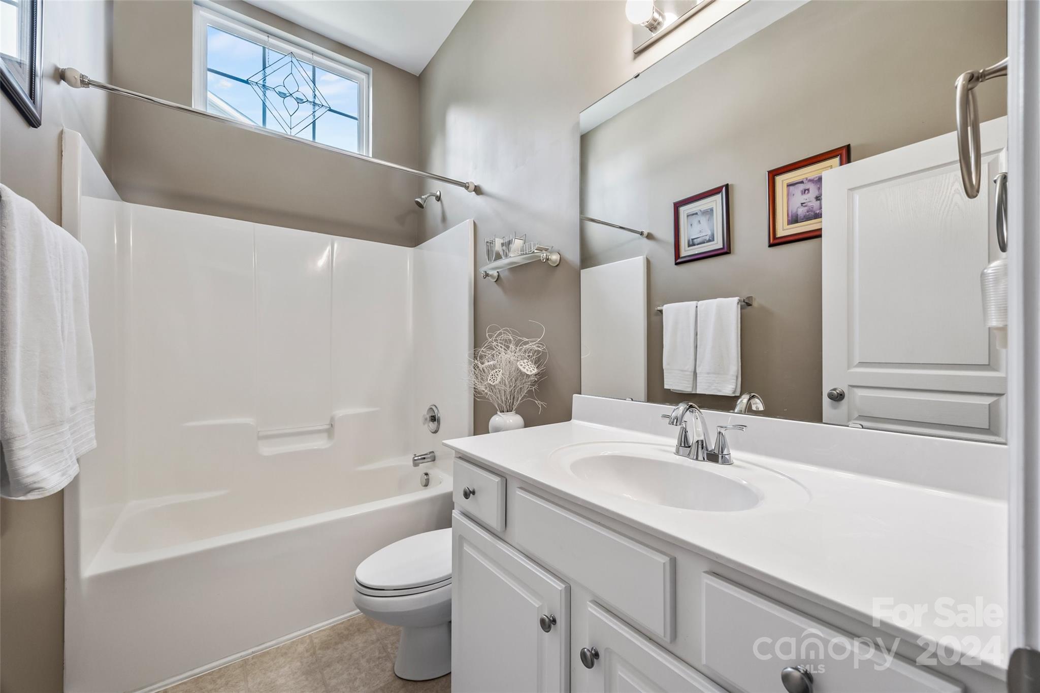296 Sand Paver Way Fort Mill, SC 29708 - Photo 27 of 41 a bathroom with a sink a toilet and shower
