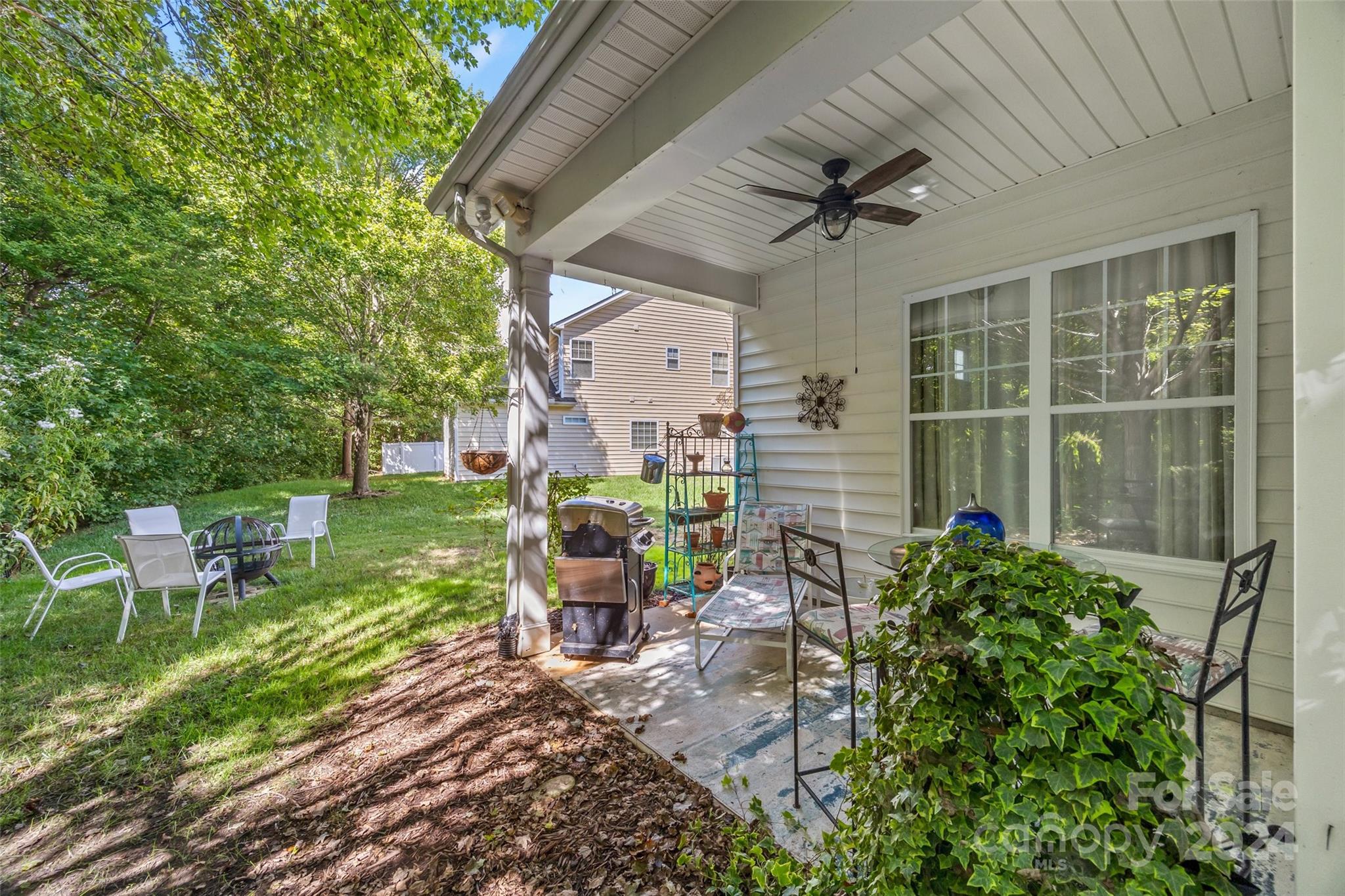 296 Sand Paver Way Fort Mill, SC 29708 - Photo 29 of 41 a backyard of a house with outdoor seating