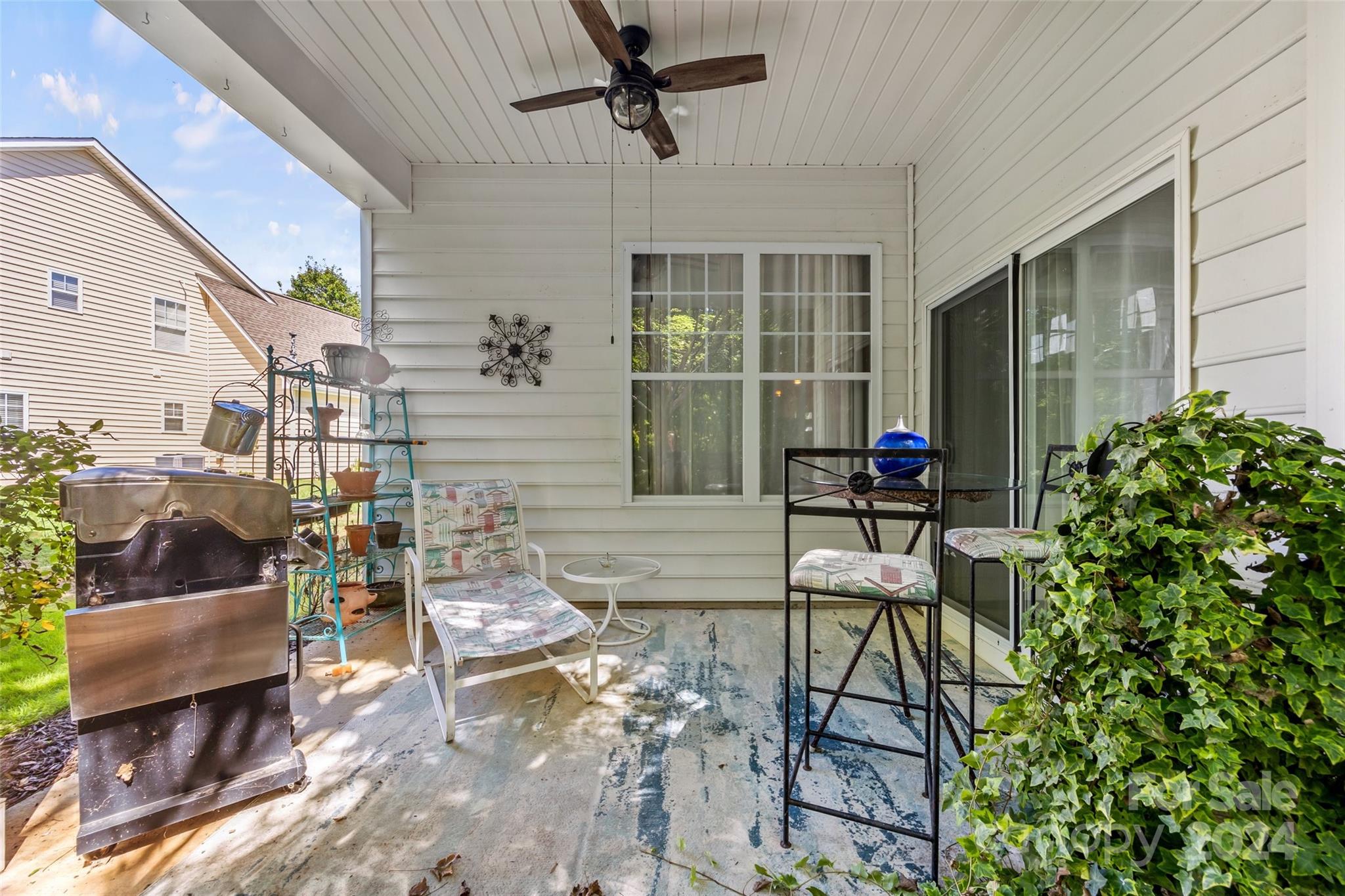 296 Sand Paver Way Fort Mill, SC 29708 - Photo 30 of 41 a view of a chairs and table in the patio
