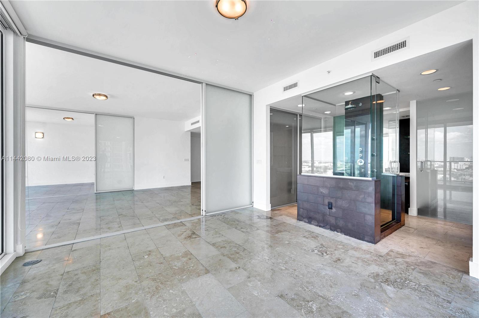 1040 Biscayne Boulevard, Unit 2107 Miami, FL 33132 - Photo 23 of 50 a view of a hallway