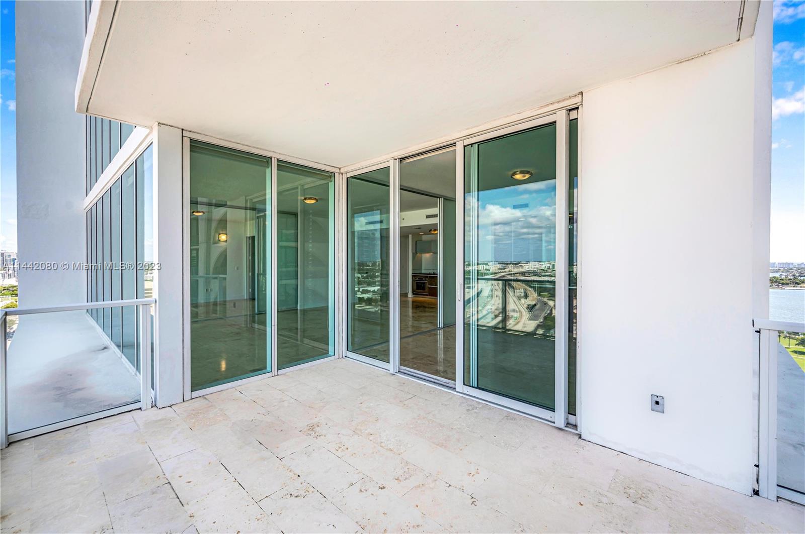 1040 Biscayne Boulevard, Unit 2107 Miami, FL 33132 - Photo 33 of 50 a view of a glass door of the house
