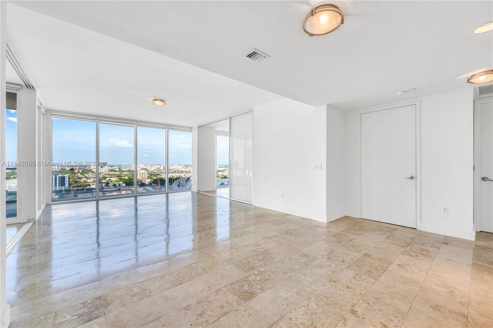 1040 Biscayne Boulevard, Unit 2107 Miami, FL 33132 - Photo 7 of 50 a view of a kitchen