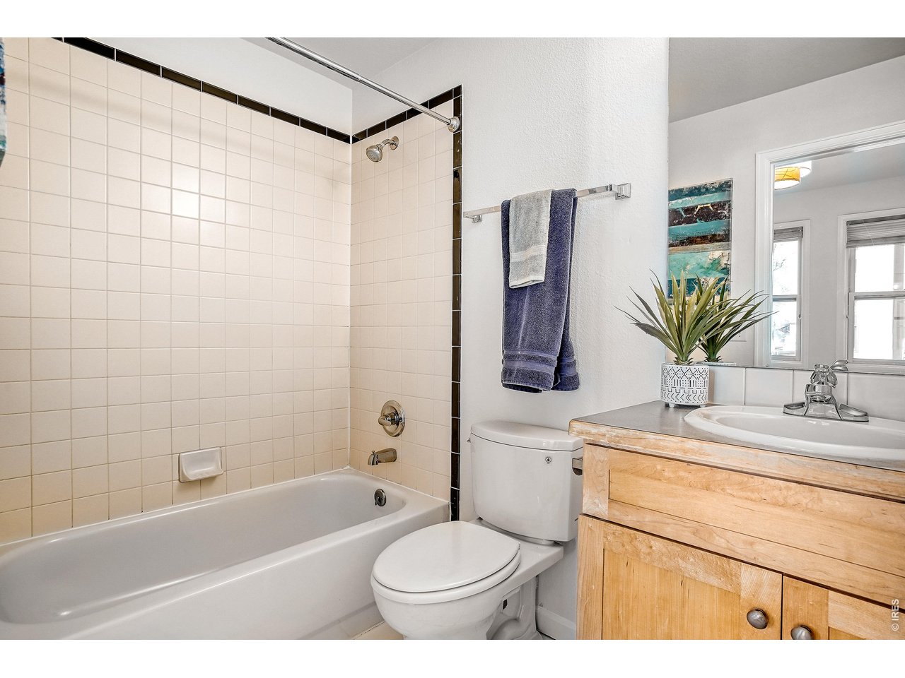 1715 15th Street, Unit 4 Boulder, CO 80302 - Photo 14 of 24 Primary bedroom with private full bathroom