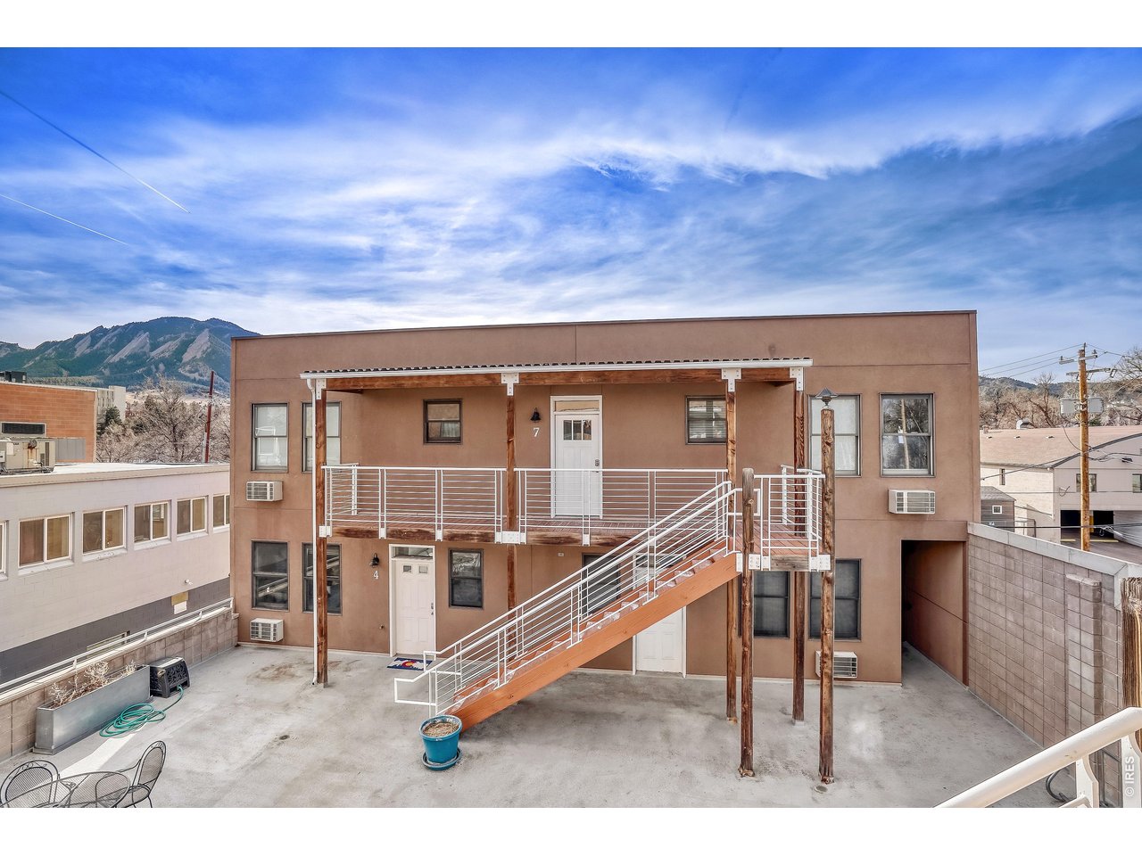 1715 15th Street, Unit 4 Boulder, CO 80302 - Photo 4 of 24 Upper level courtyard area looking at unit #4