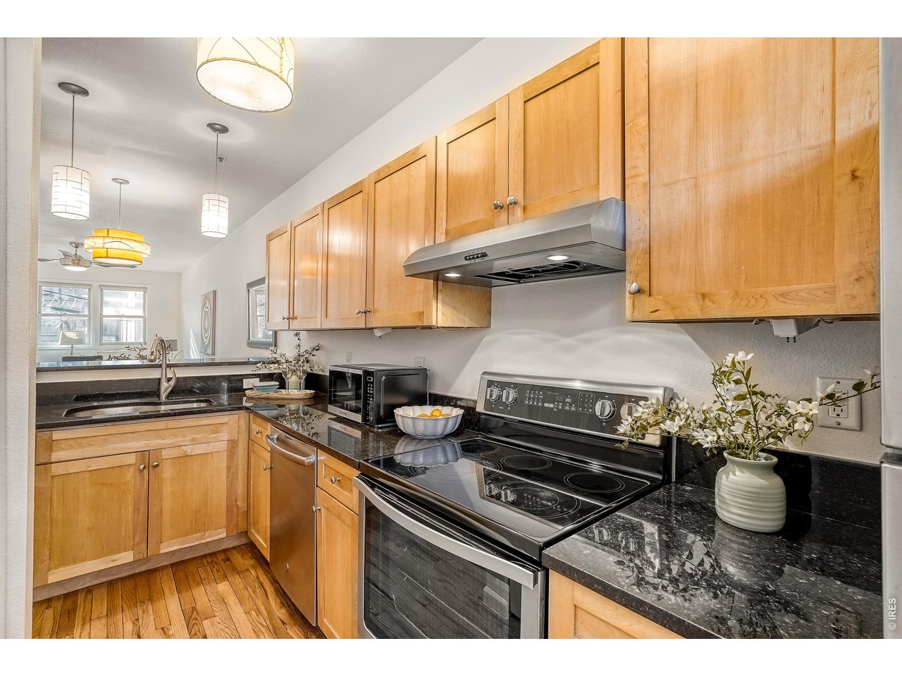 1715 15th Street, Unit 4 Boulder, CO 80302 - Photo 10 of 24 Kitchen with plenty of cabinets and open to dining and living area