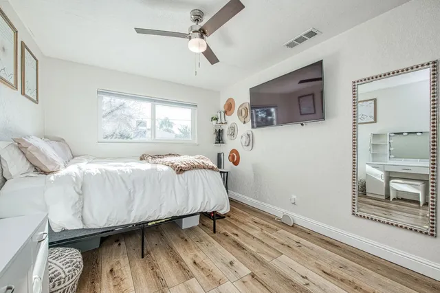 a bed room with a bed and a window