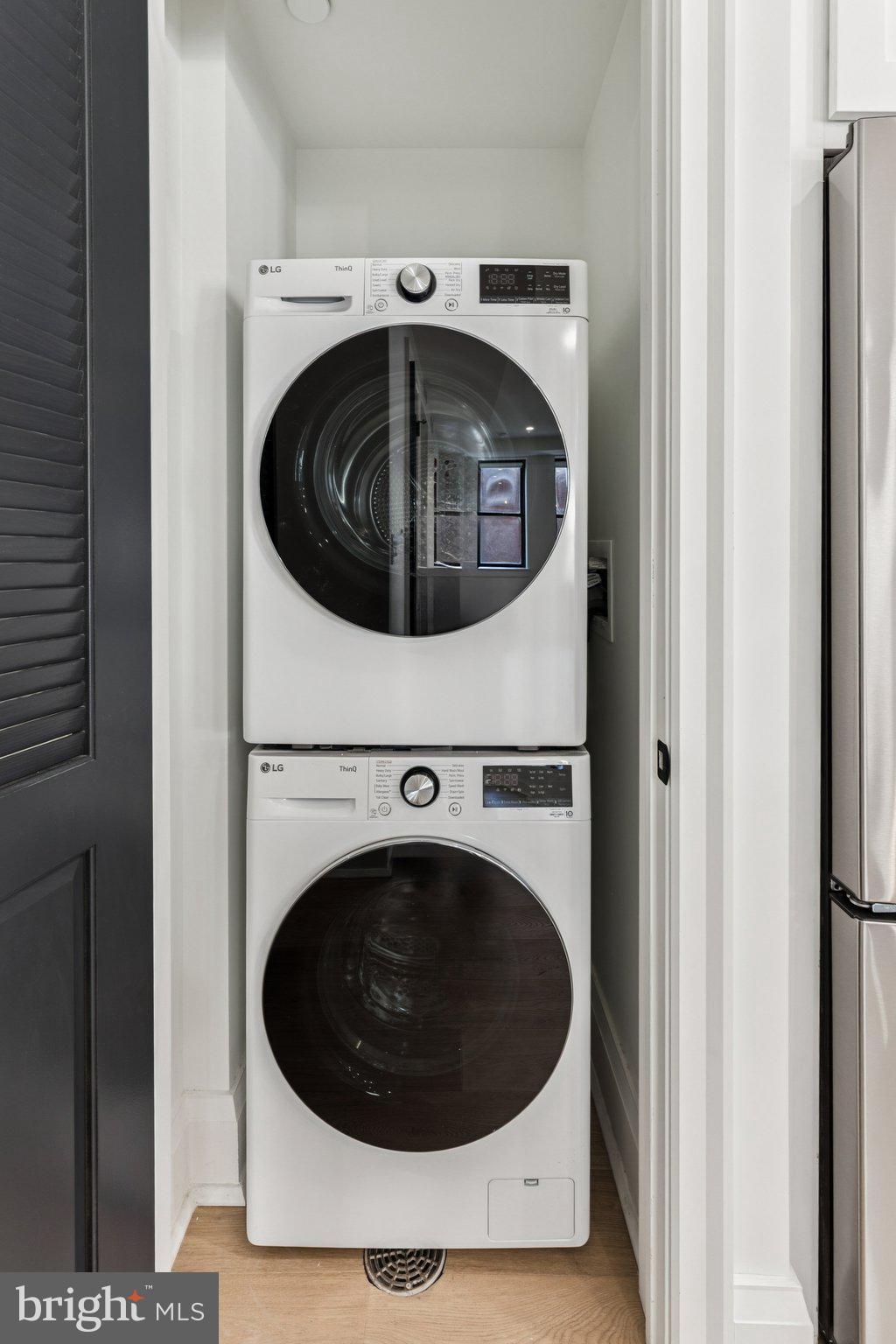 135 South 19th Street, Unit 308 Philadelphia, PA 19103 - Photo 16 of 24 a utility room with dryer and washer