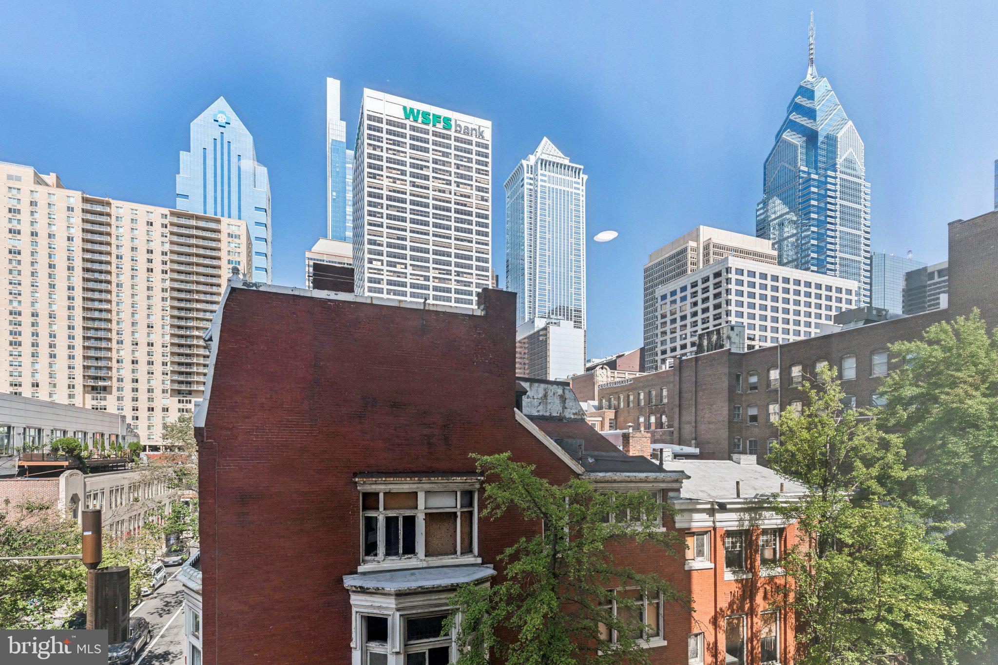 135 South 19th Street, Unit 308 Philadelphia, PA 19103 - Photo 17 of 24 a front view of a building with glass windows