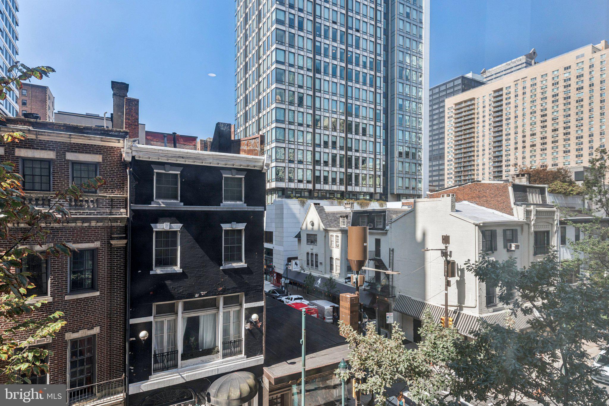 135 South 19th Street, Unit 308 Philadelphia, PA 19103 - Photo 18 of 24 a city street filled with lots of tall buildings