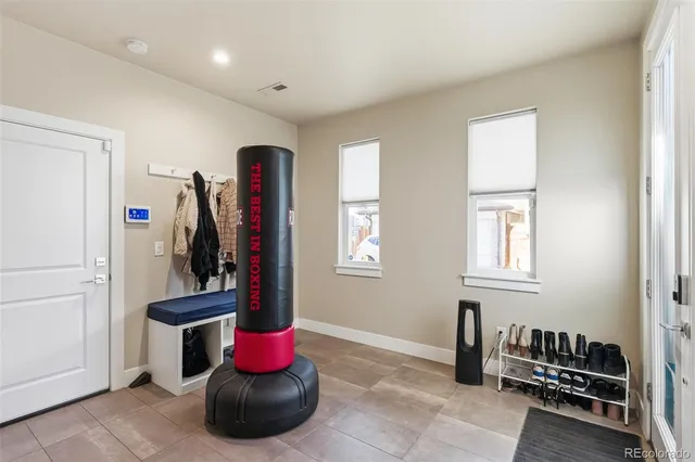 a view of entryway with wooden floor