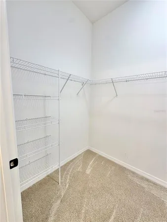 a view of a room with racks on the wall