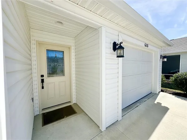 a view of a front door and a hallway