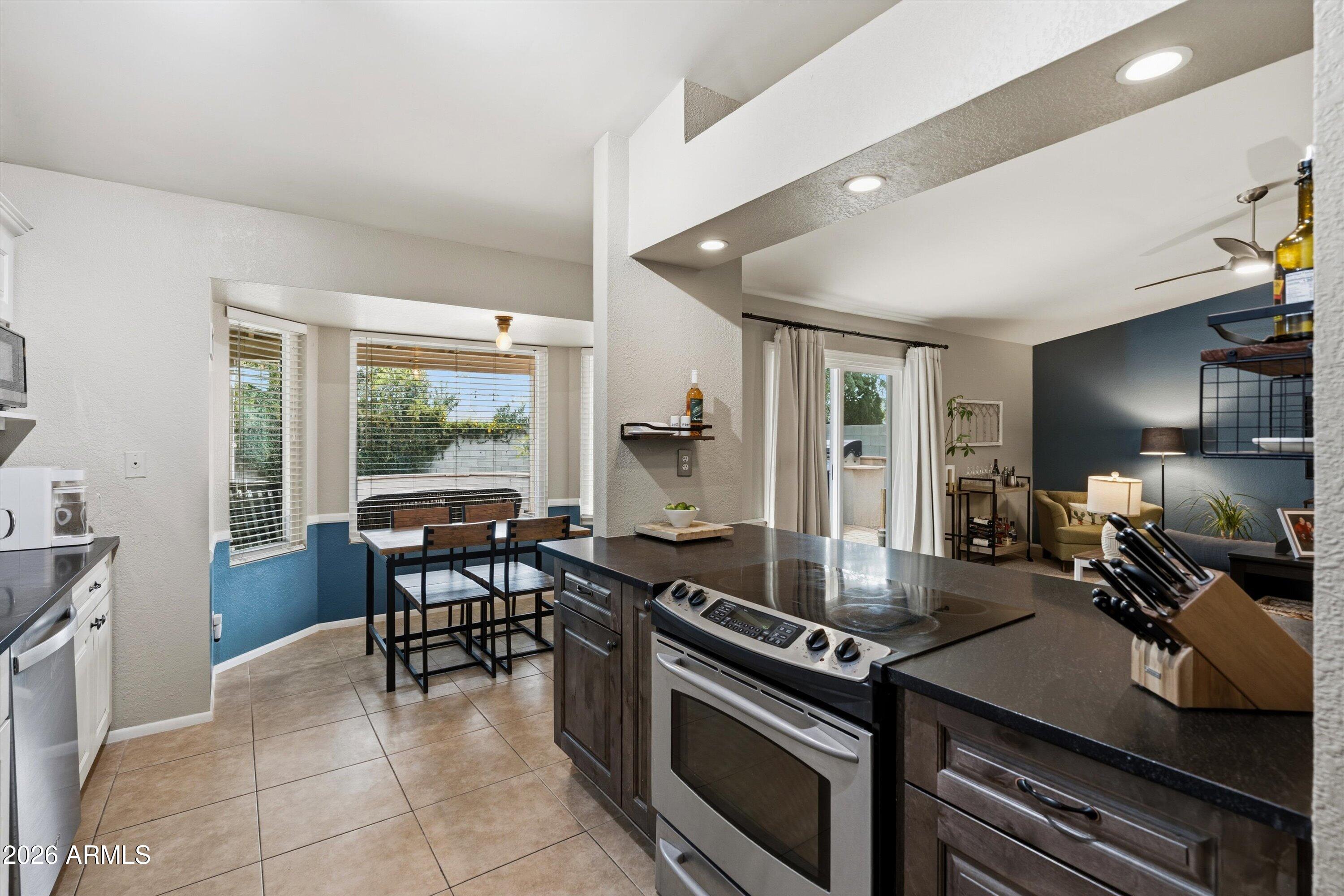 3133 East John Cabot Road Phoenix, AZ 85032 - Photo 11 of 30 12-Kitchen to Dining