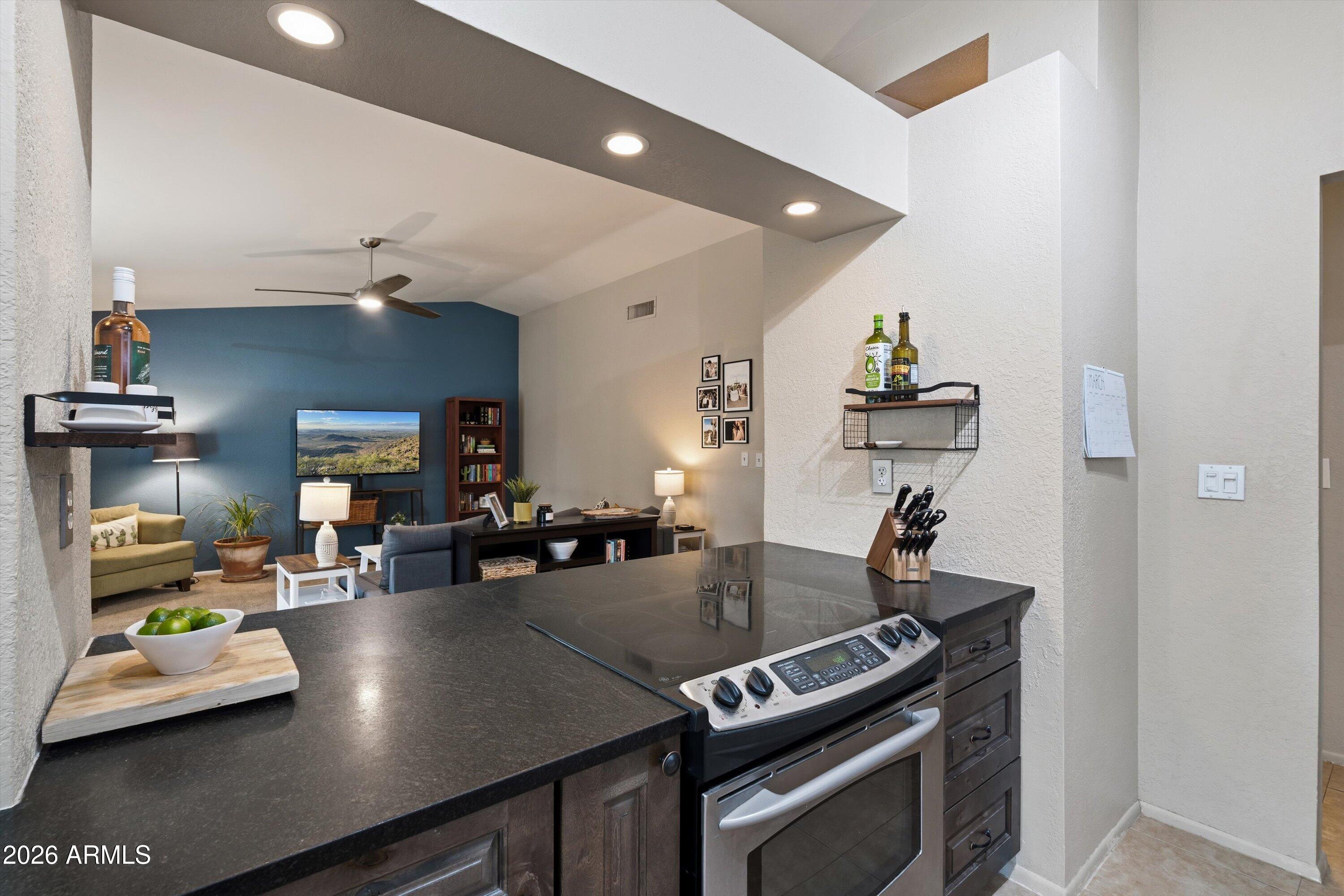 3133 East John Cabot Road Phoenix, AZ 85032 - Photo 14 of 30 16-Kitchen to Living