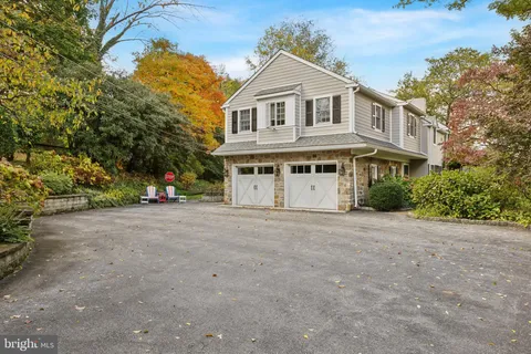 a view of a house with a street
