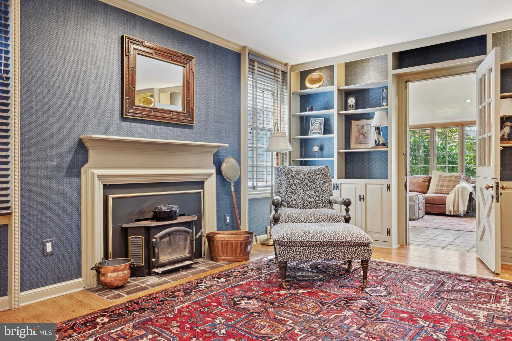 1532 Waverly Road Gladwyne, PA 19035 - Photo 9 of 40 a living room with furniture and a fireplace