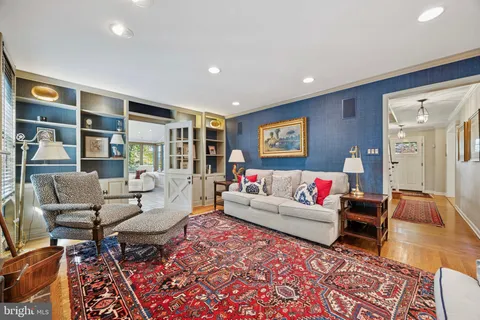 a living room with furniture and a couch