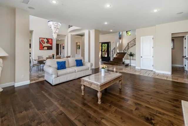 a bathroom with a sink a toilet a shower and a mirror