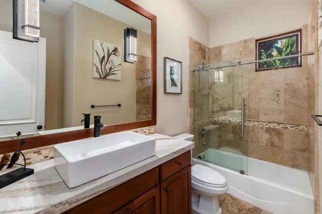 a view of a balcony with wooden floor