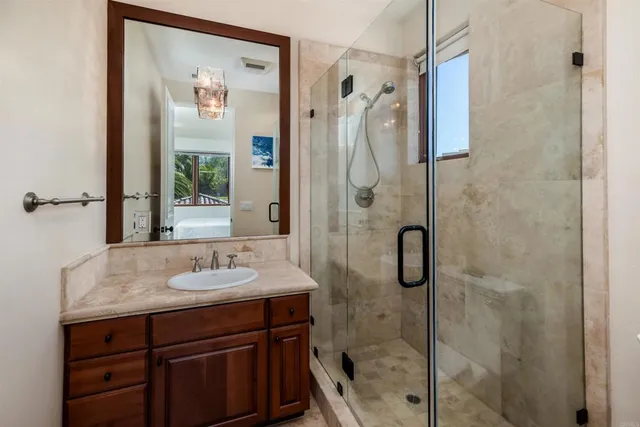 a view of a swimming pool with a table and chairs