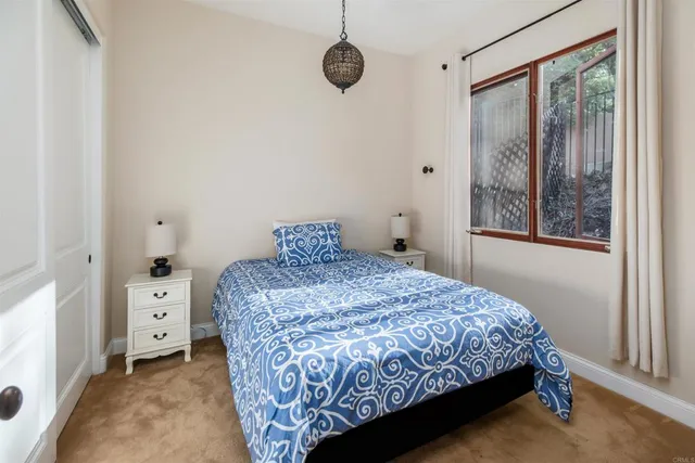 a view of a swimming pool with a yard