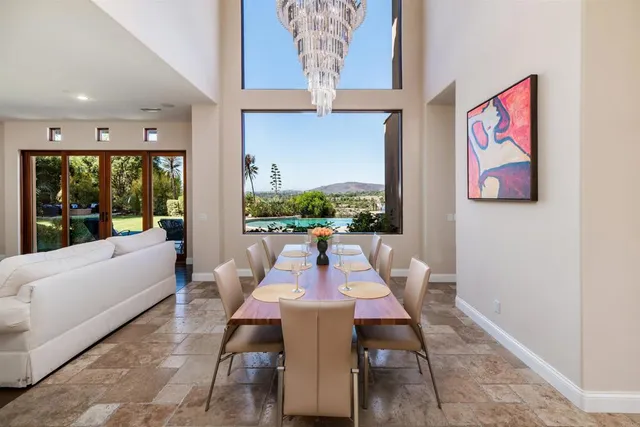 a living room with fireplace furniture and a flat screen tv