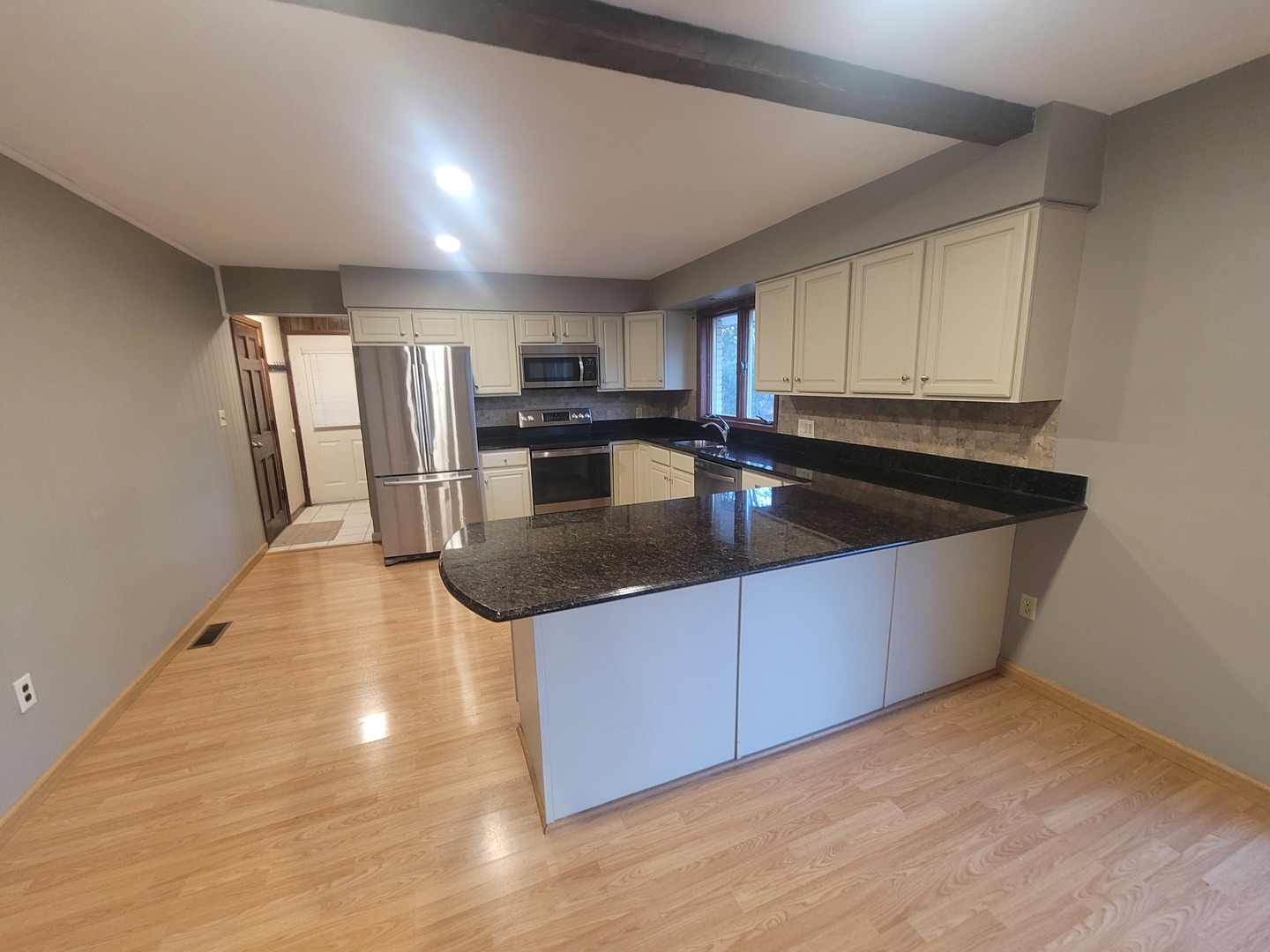 524 North 34th Street Mount Vernon, IL 62864 - Photo 16 of 34 a kitchen with stainless steel appliances granite countertop a sink window and cabinets