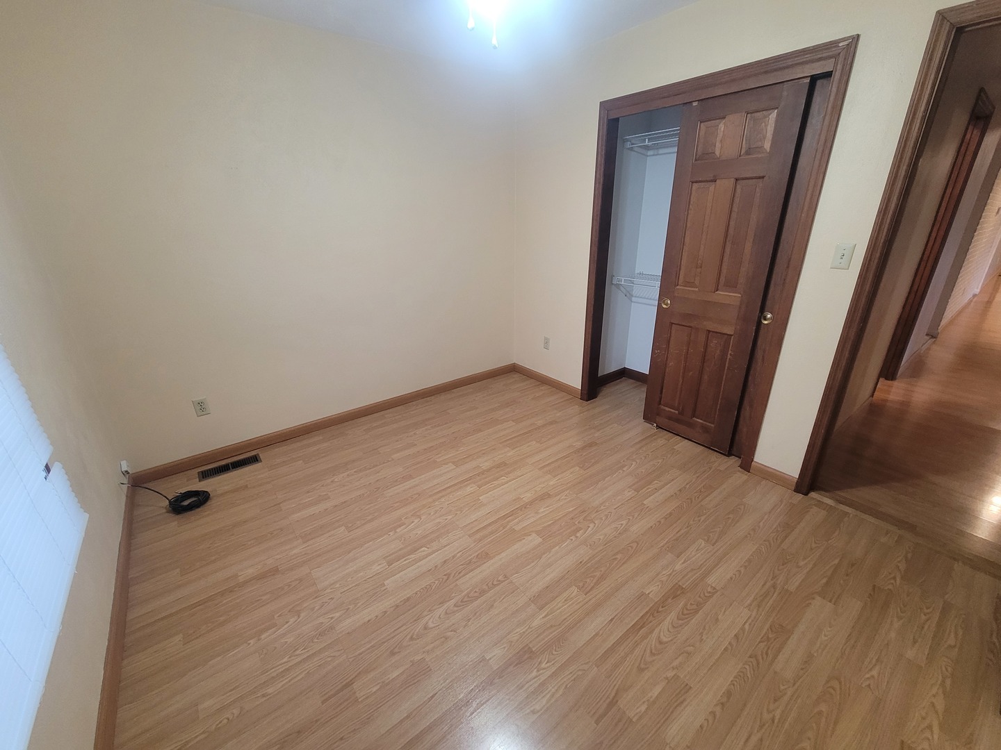 524 North 34th Street Mount Vernon, IL 62864 - Photo 20 of 34 an empty room with wooden floor and a window