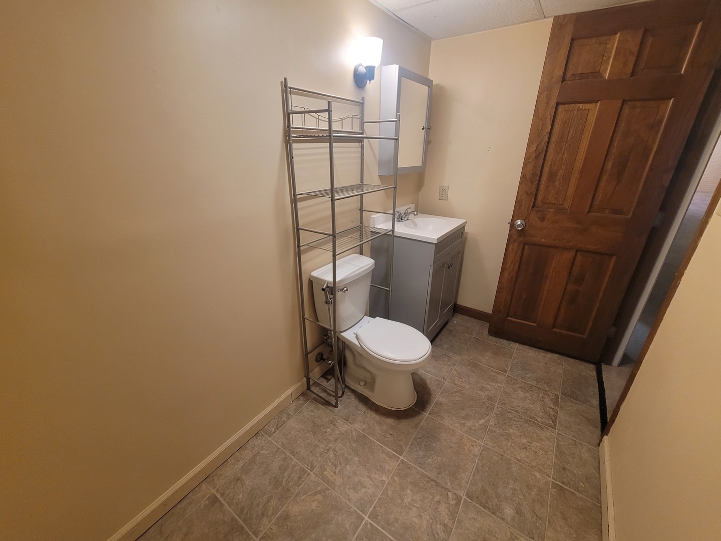 524 North 34th Street Mount Vernon, IL 62864 - Photo 26 of 34 a white toilet sitting next to a bathroom sink