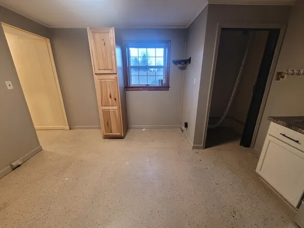 an empty room with windows