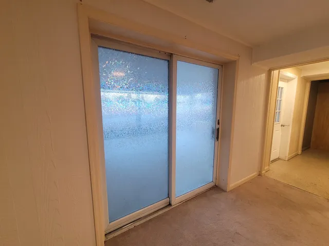 a view of elevator with hallway