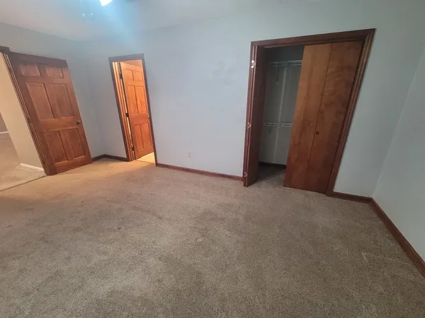 an empty room with closet